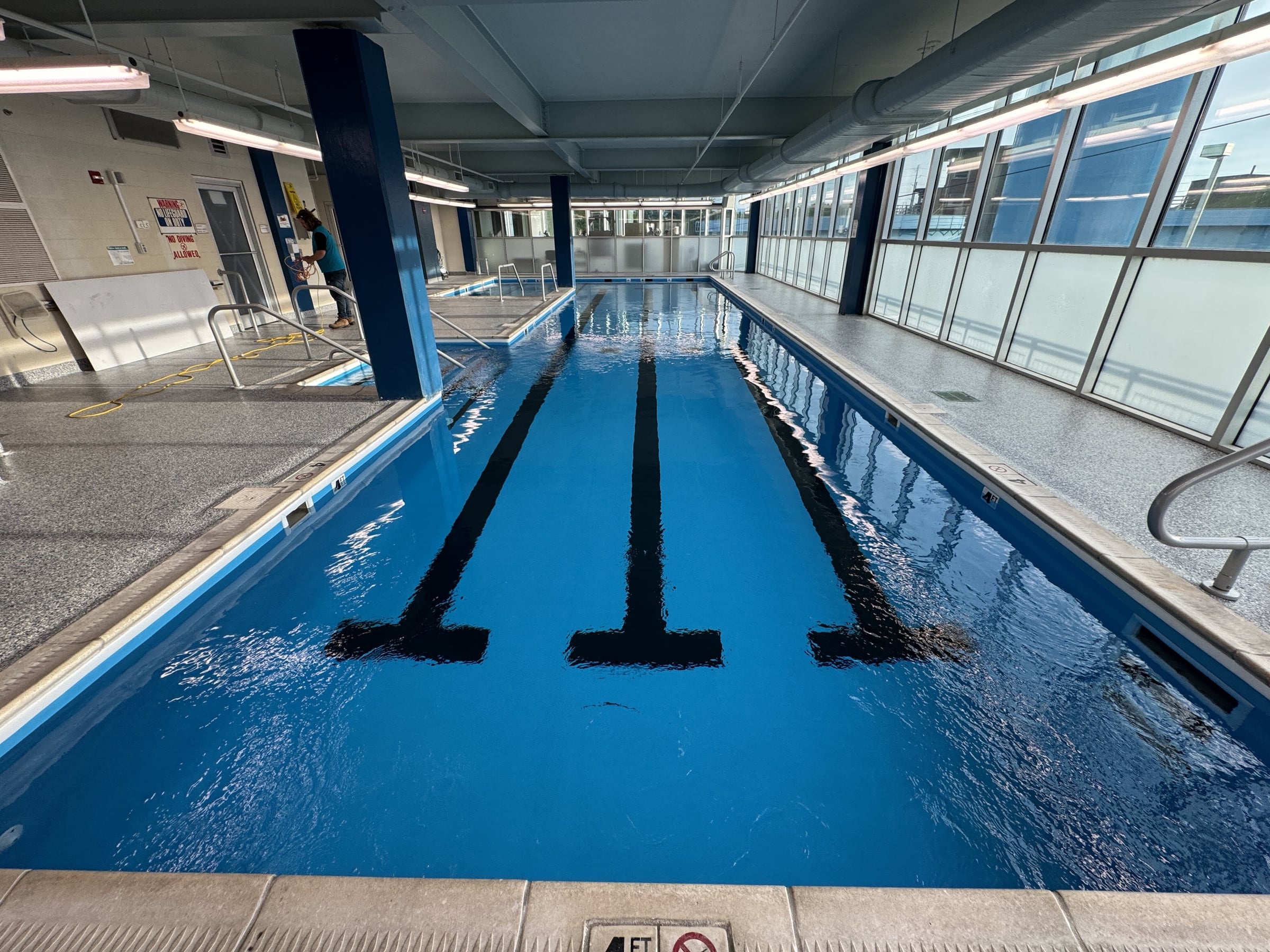 Completed indoor rehabilitation pool with light blue reinforced PVC membrane
