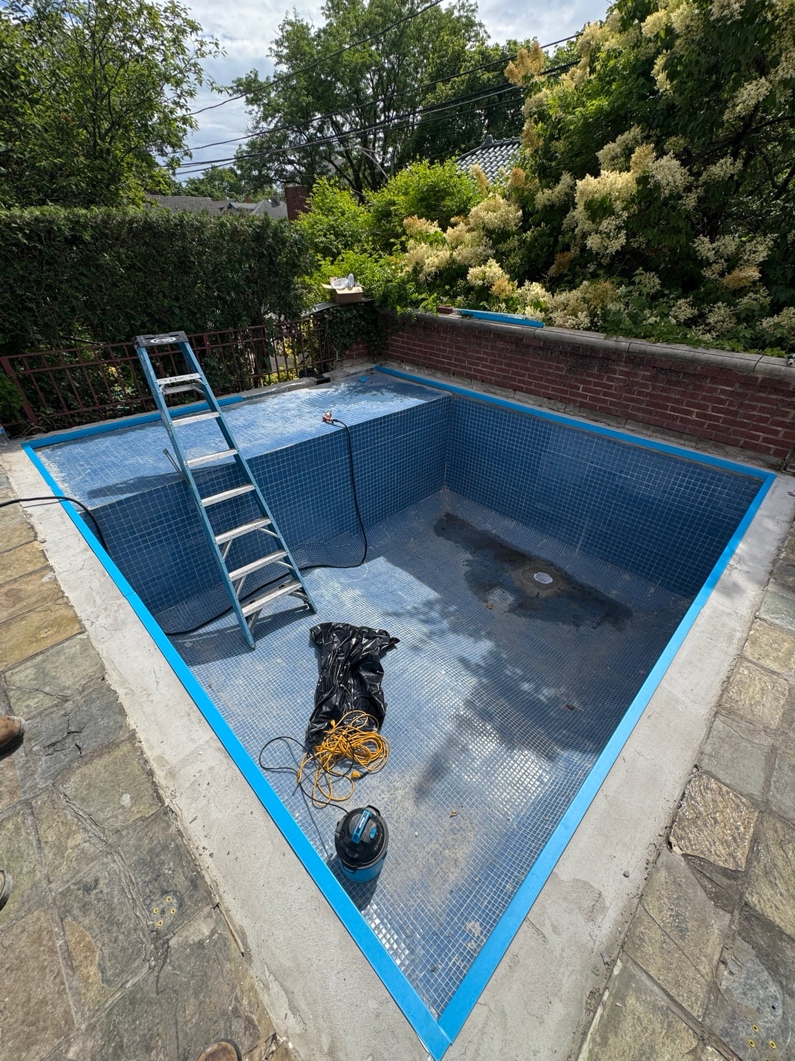 Original tiled surface and sun deck at the Chicago residential pool