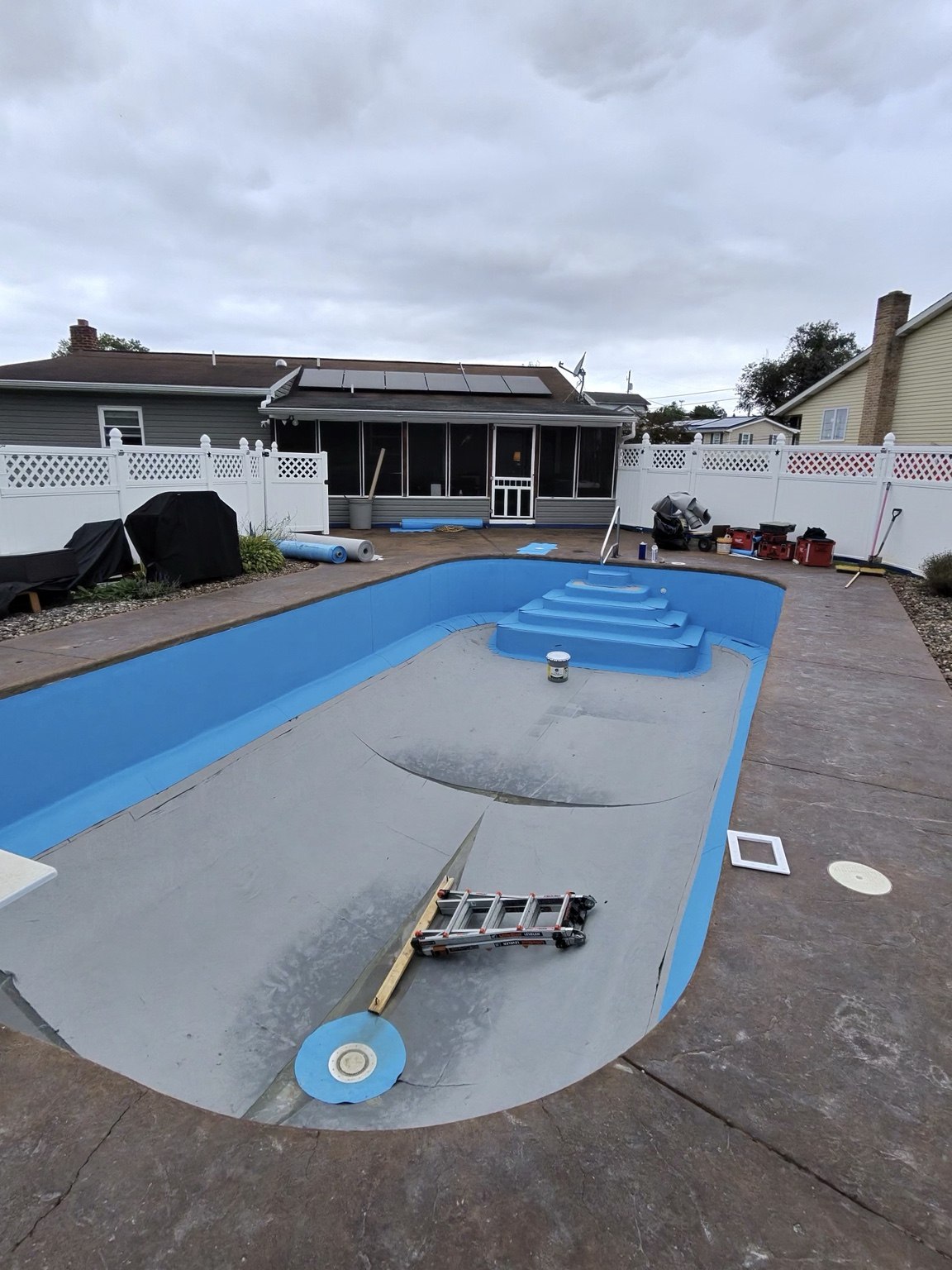 Adriatic Blue membrane on the Millersburg pool walls and steps with felt still visible on the floor