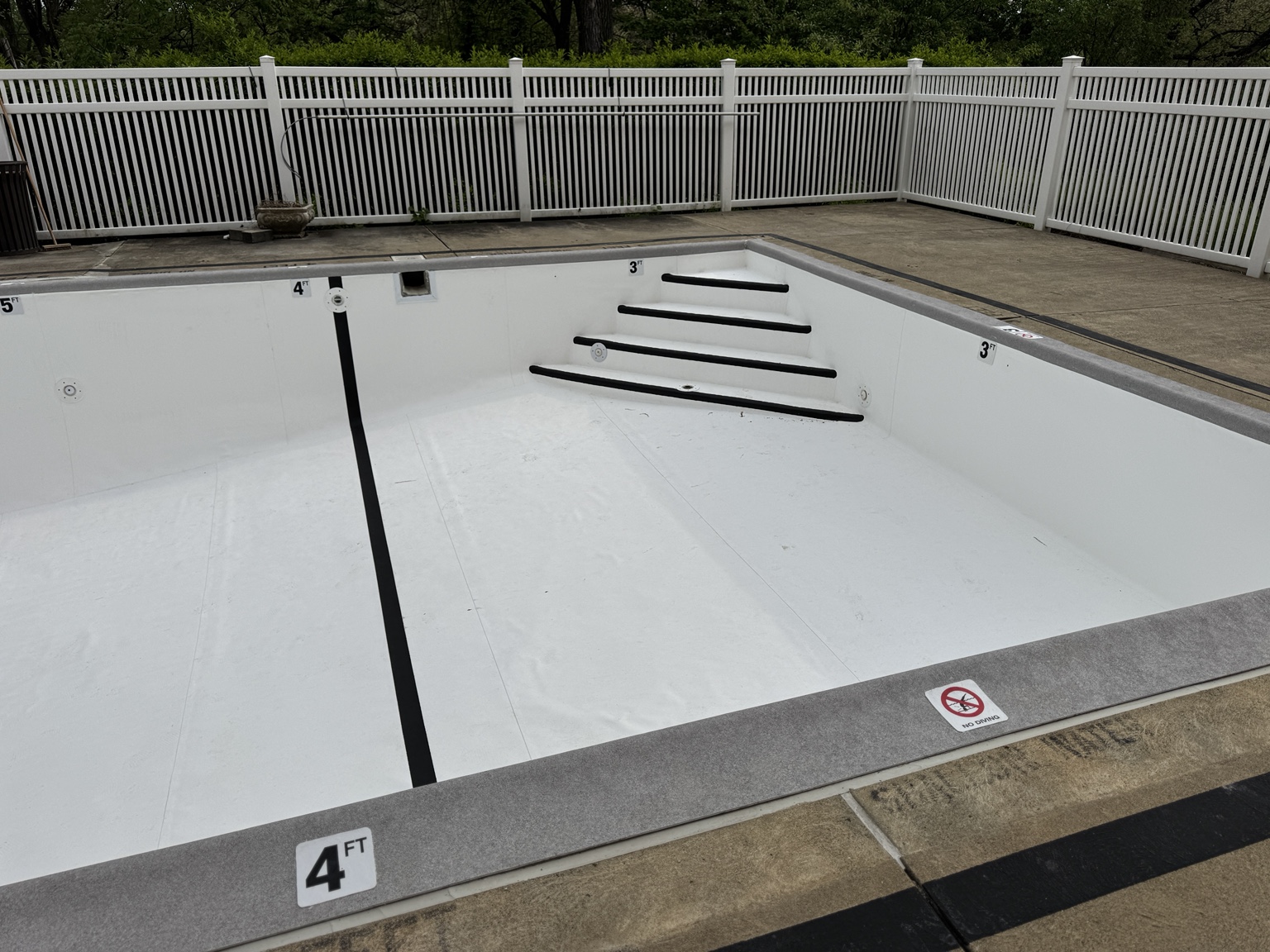 Completed pool steps and black safety nosings in Pittsburgh